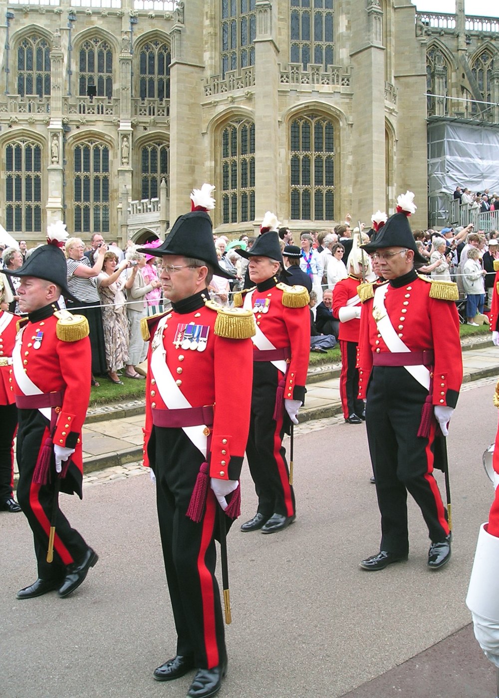 Military Knights of Windsor in uniform processing to St George's Chapel