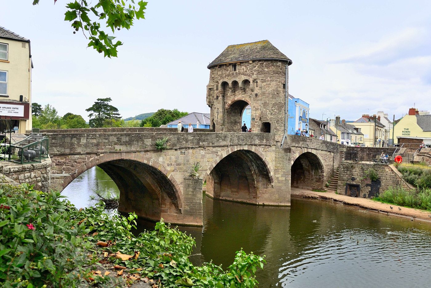 Monnow Bridge and its medieval gate tower over the River Monnow